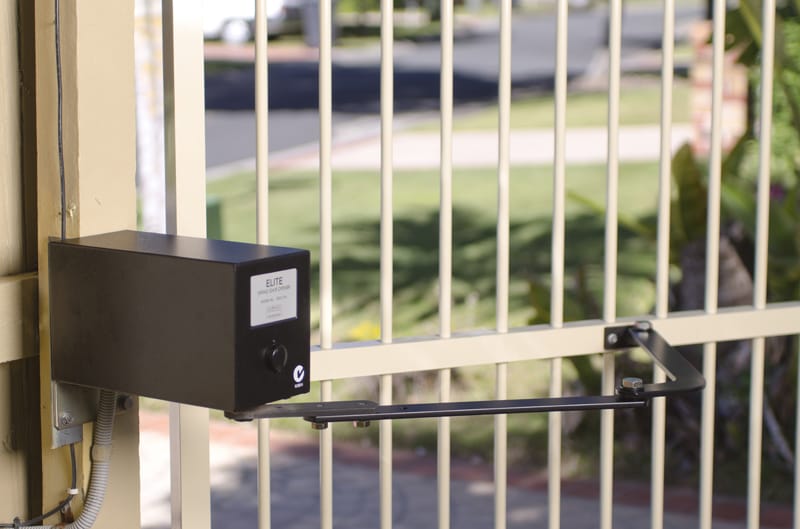 Automated swing gate with operator at a residential property