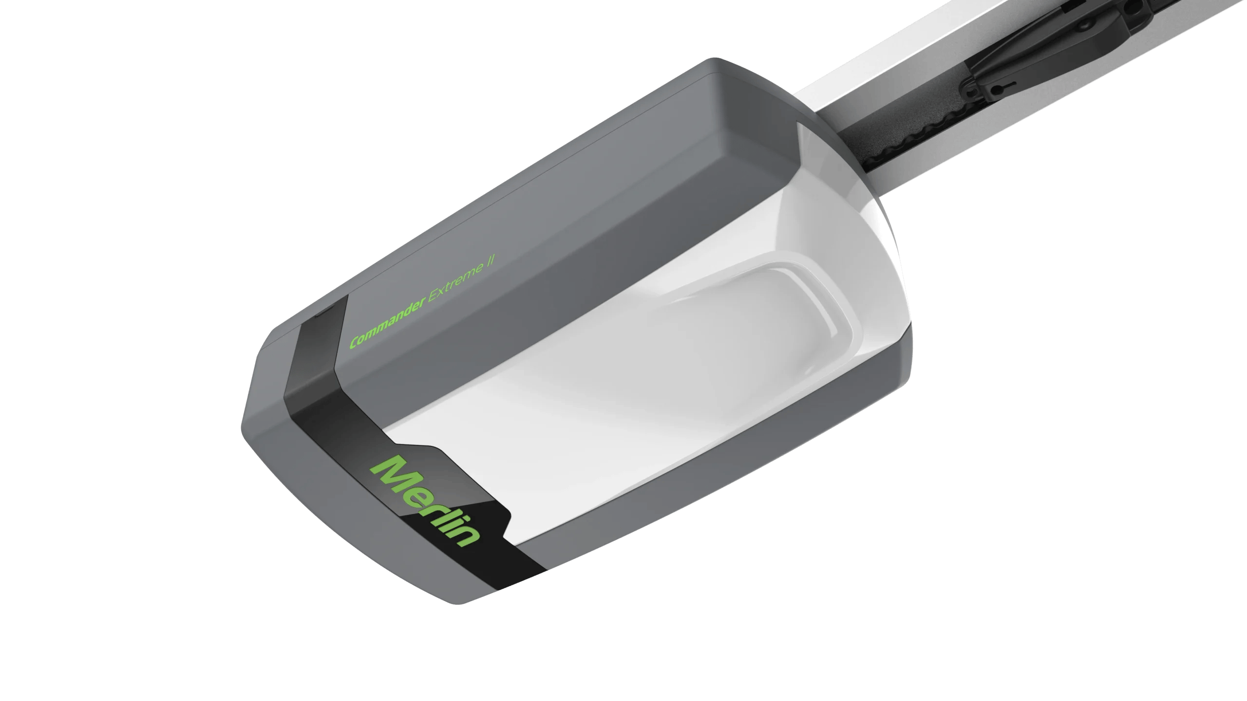 Close-up of a gray handheld cutting tool with a retractable blade and green 'Commander Extreme II' label on the housing.