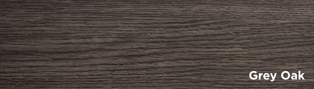 Grey Oak wood texture swatch with dark brown-grey grain and the label 'Grey Oak' in the bottom-right corner.